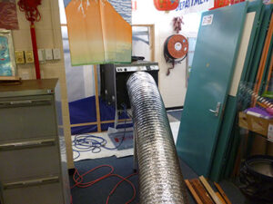 Negative air unit for asbestos vinyl floor removal friable enclosure