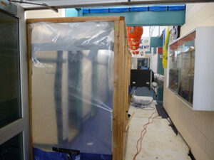 Three stage decontamination showers for asbestos vinyl floor removal